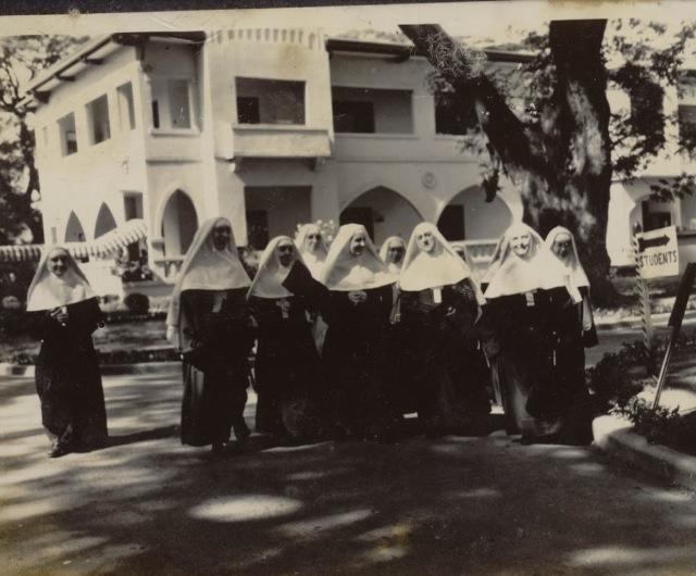 Assumption Nuns smiling as they walk down the driveway. Imagine how things were before. How were students edified by these scenes of nuns chatting, walking in full-habits? Here in this photo, taken from a batch album of Old Girls in Picasa, we see Sor Rosa (eventually known as Mo. Rose) and the Mother General visiting the PHL