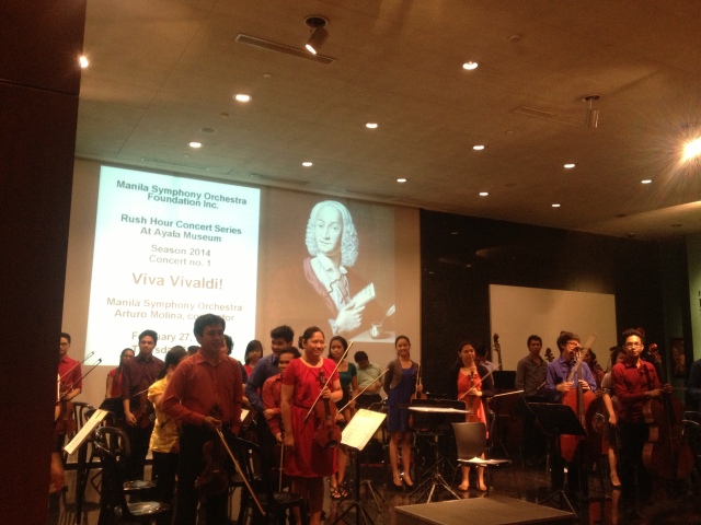 The Manila Symphony Orchestra posing for their last bow during the Viva Vivaldi concert at the Ayala Museum.