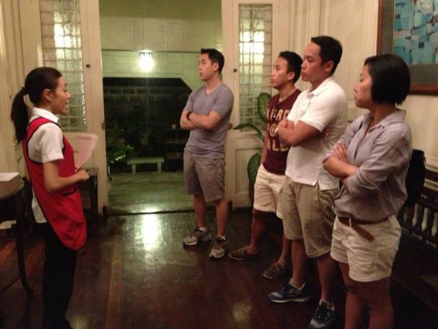 The Aguinaldo siblings listening as they started their tour at the foyer