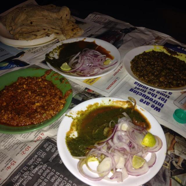 Ox brain, chicken keema and lentejas with hot fluffy roti served on our car's hood at Bademiya, Colaba