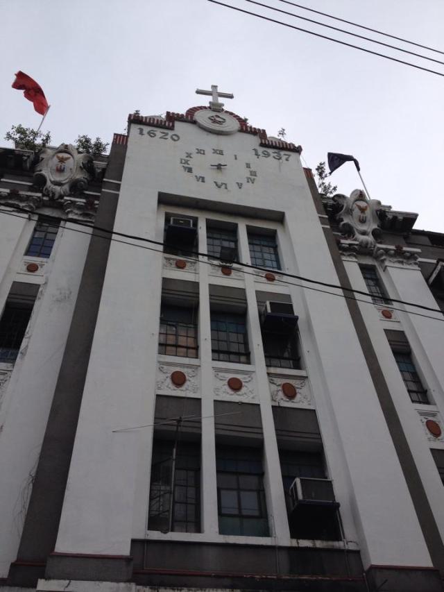 The clock tower of Letran bears the date of establishment and the date when the "new" building was erected (1937).